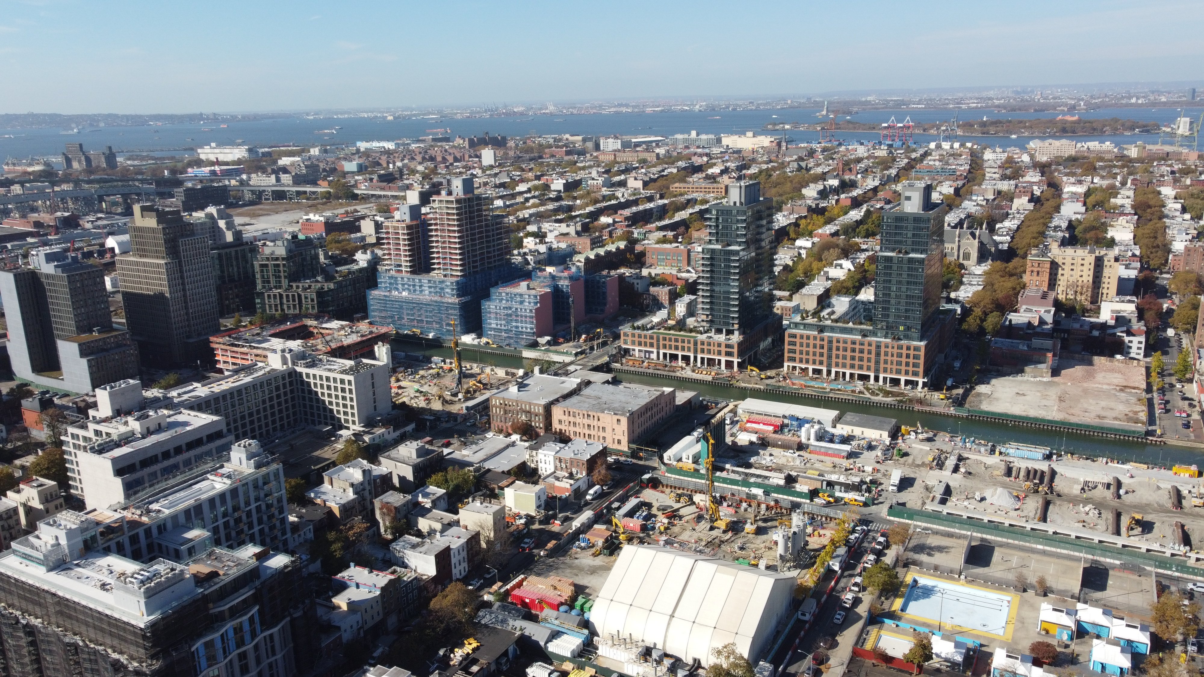 Aerial perspective of Gowanus redevelopment corridor, with mixed-use projects integrating storefront retail and community facilities.