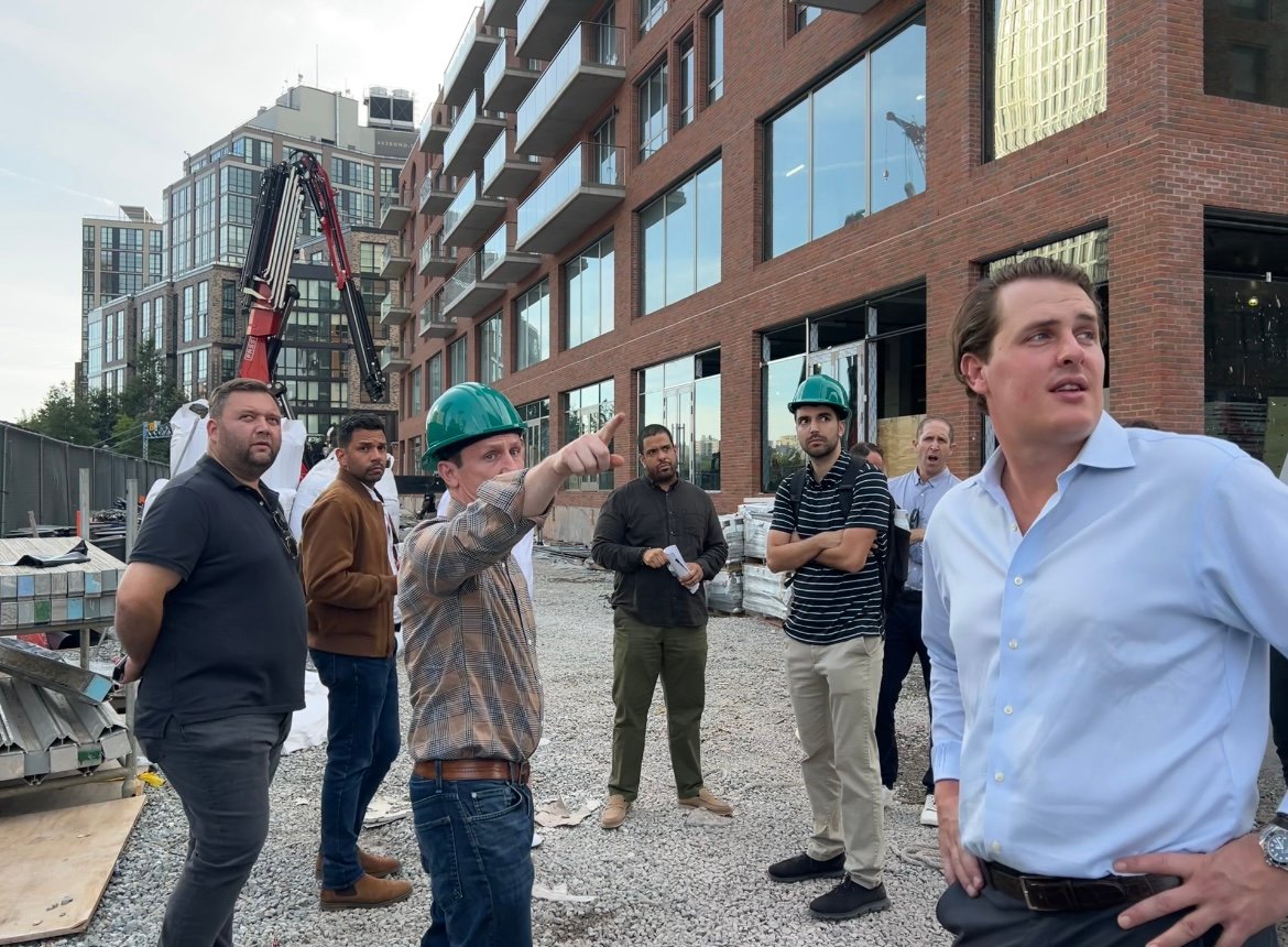 Nate Mallon and Fritz Richter, Co-Chairs of the REBNY Brooklyn Commercial Committee, speaking to attendees outside 395 Carroll Street about Gowanus development.